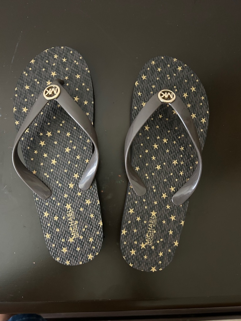 Michael Kors Black and Gold Star-Print Flip Flops